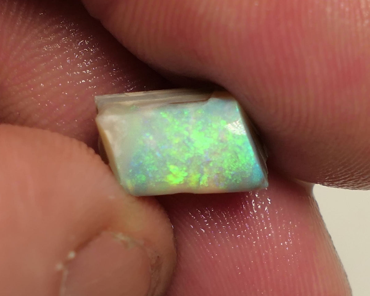 Mintabie Opal 4cts Seam rough rub  Yellow Green Dominant Bright Multifires in the bar Packed with Potential 12x6x5mm 4APR