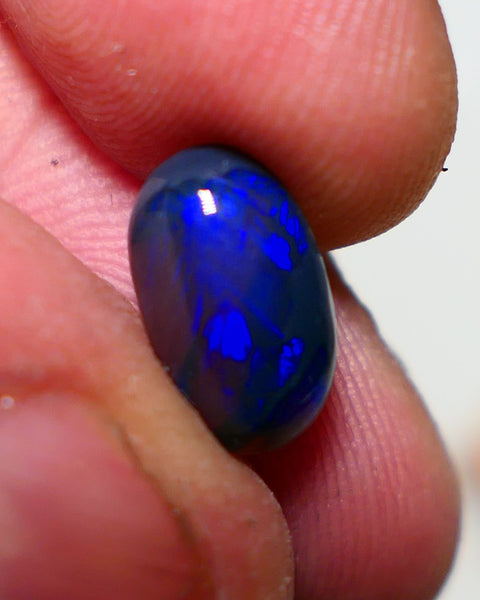 Lightning Ridge Semi Black Crystal Opal High Dome Gemstone 2.00cts GEM Grade N5 Body Tone B3 Brightness  Rolling Flash Royal Blues in various patterns 12.2x7.3x3.8mm 1327