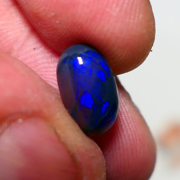 Lightning Ridge Semi Black Crystal Opal High Dome Gemstone 2.00cts GEM Grade N5 Body Tone B3 Brightness  Rolling Flash Royal Blues in various patterns 12.2x7.3x3.8mm 1327