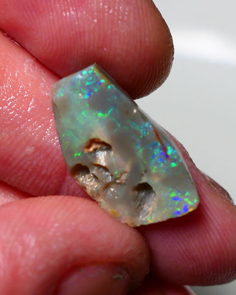 Lightning Ridge Rough Rub Opal 5.75cts Dark Seam showing areas of nice Bright Multifires 21x12x4mm 1311