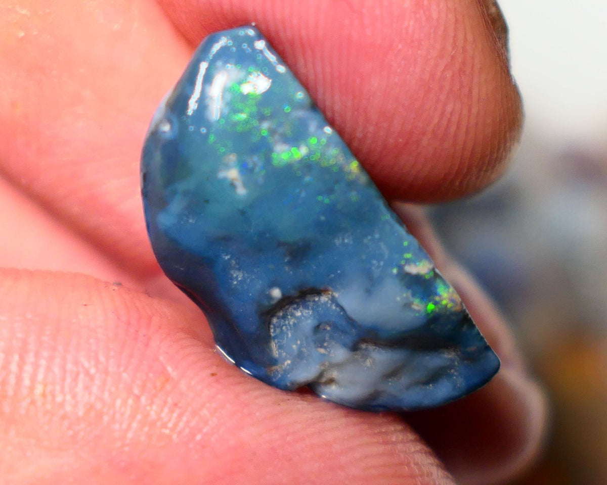 Lightning Ridge Rough Opal 12cts Dark  Half Knobby showing some Bright Yellow Blue Green 24x12x7mm A1515