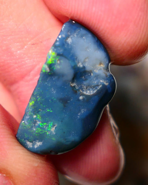 Lightning Ridge Rough Opal 12cts Dark  Half Knobby showing some Bright Yellow Blue Green 24x12x7mm A1515