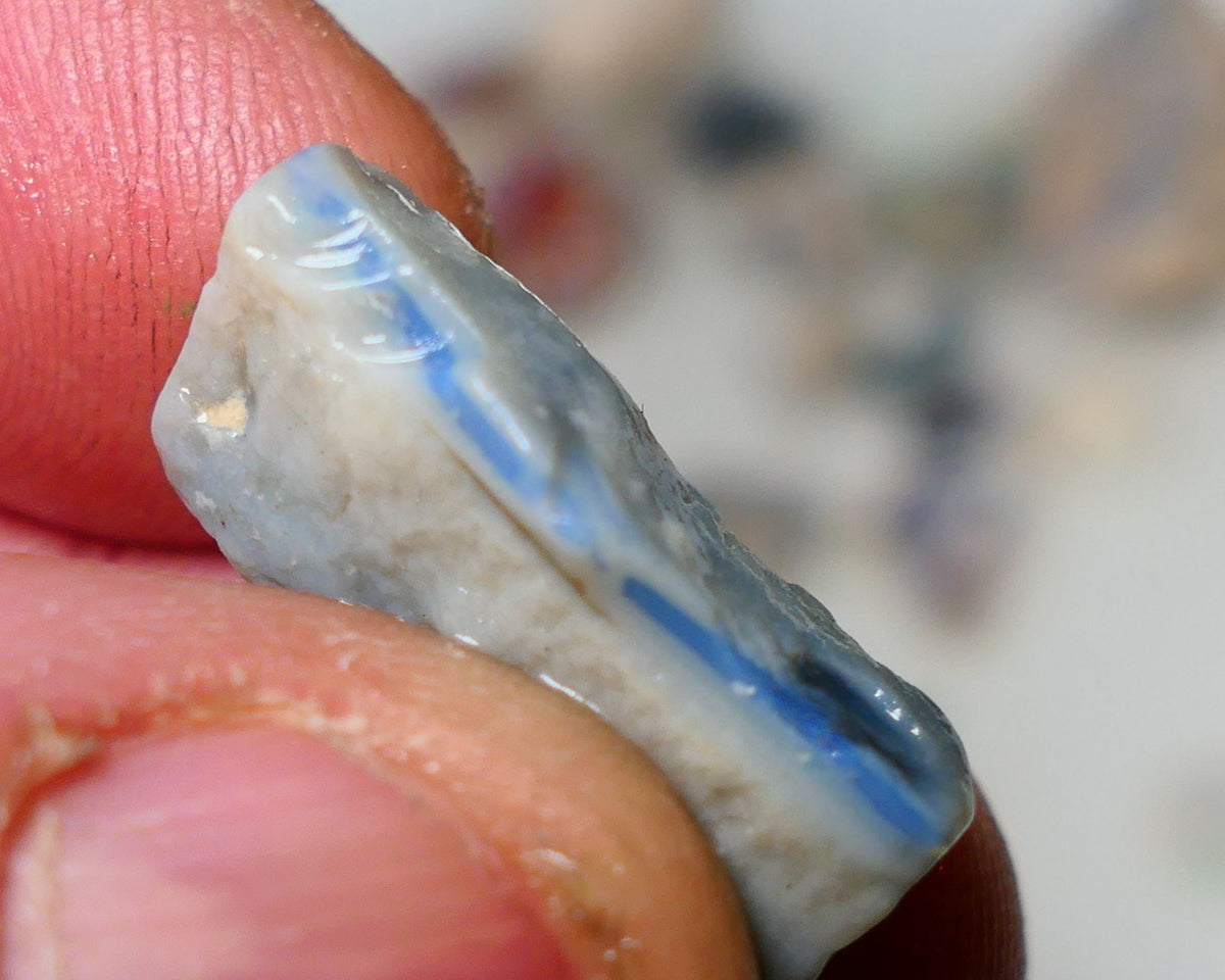 Lightning Ridge Rough Opal 12cts Dark Base Gamble Seam some bits fires in the bar 23x9x6mm Auction NS001