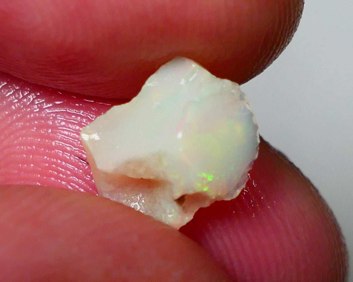 Coober Pedy Rough Opal 2.00cts White/Light Seam showing some nice multi colours 12x8x4mm NS076