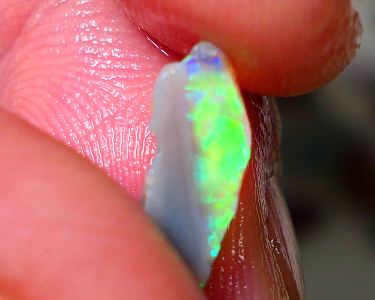 Small Candy to Cut Crystal on dark base 1.80cts Exotic bar with Vivid & Bright fires 14x5x4mm NS144