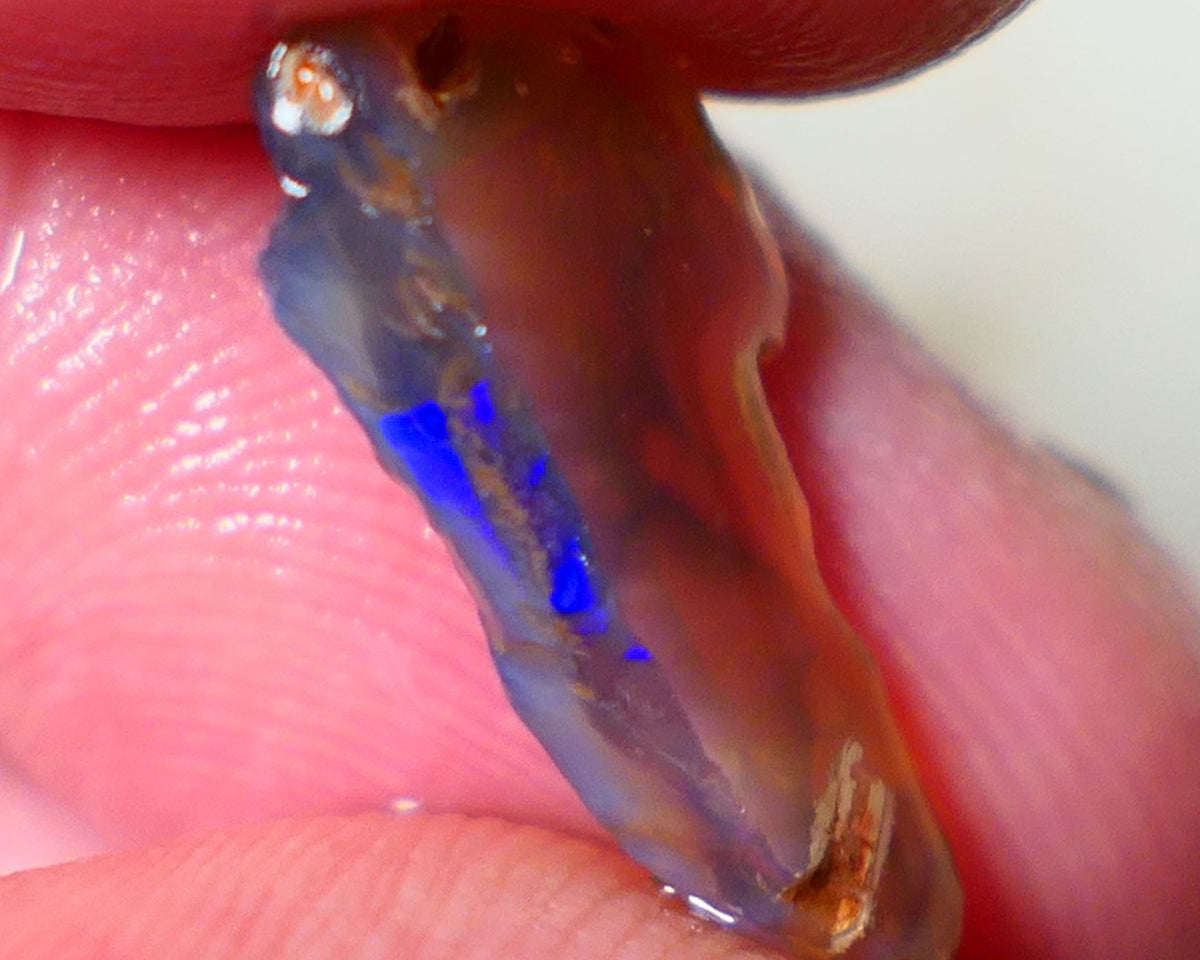 Lightning Ridge Opal Dark Crystal Base Seam Rough Rub 3.50cts Directional Blocky/Broad pattern with blues 18x9x3mm NS187