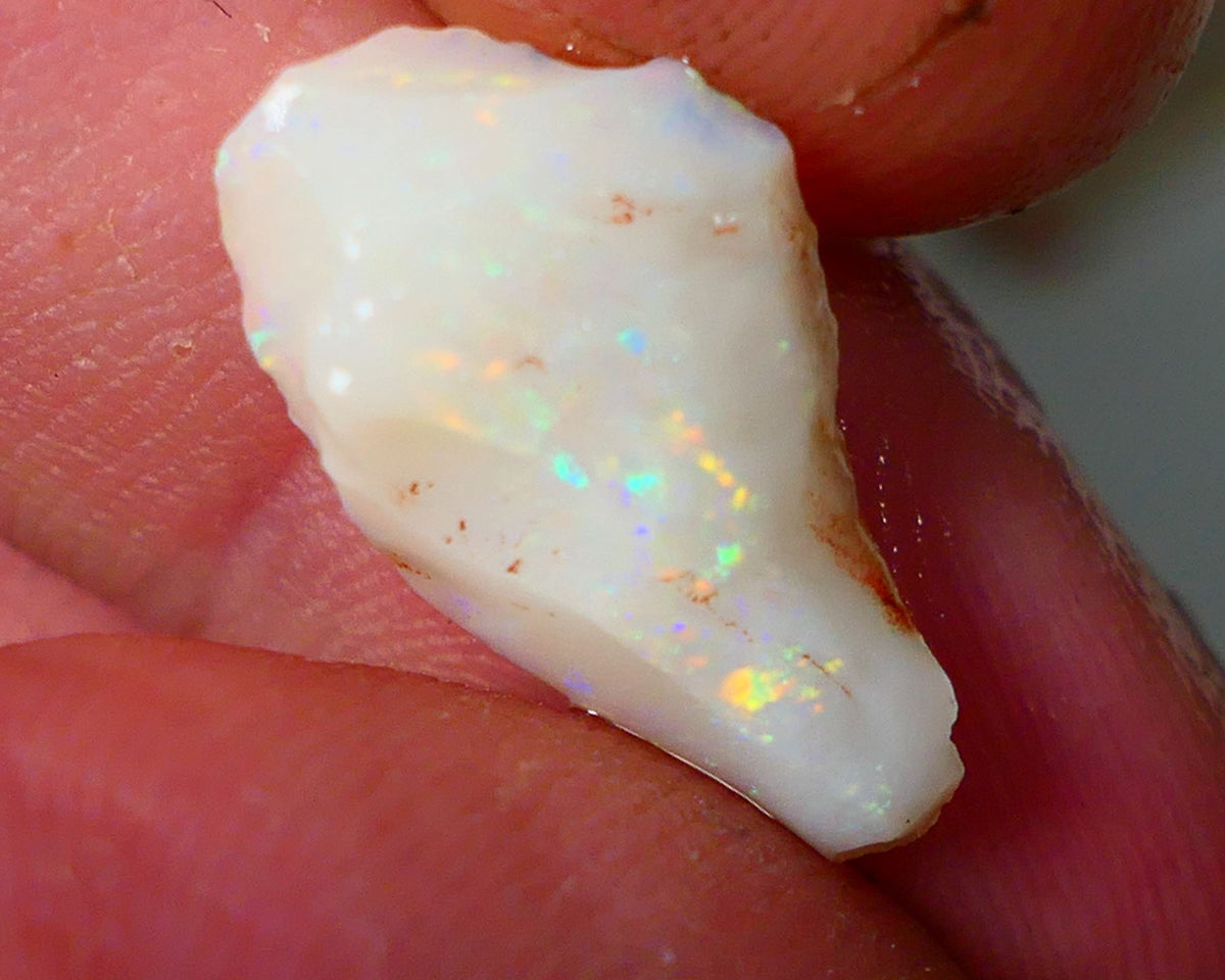 Lightning Ridge Rough Opal 4.25cts Light base Seam showing Yellow/Orange Dominant M.colours to cut 19x11x5mm NS334