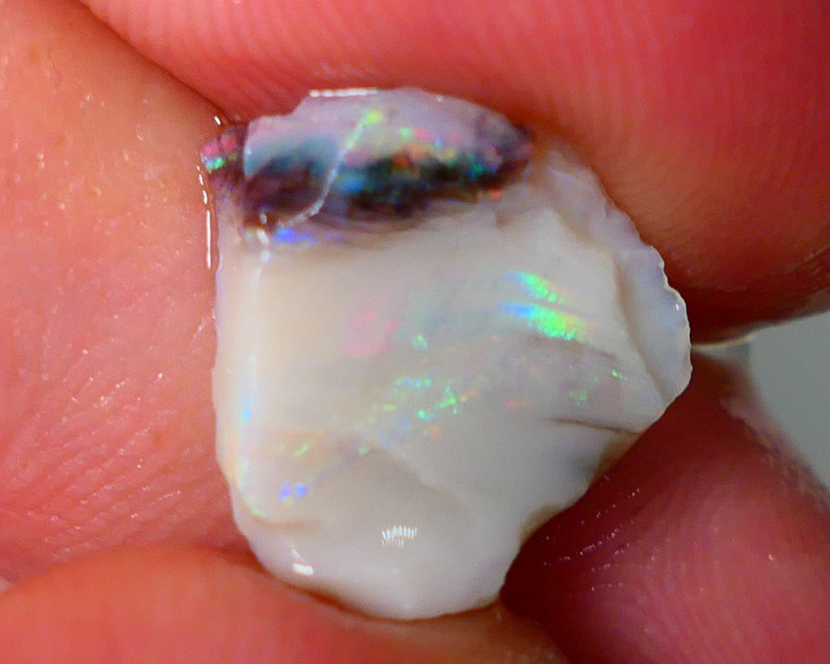 Lightning Ridge Rough Opal 4.15cts Light base Seam showing Green / BLue Dominant M.colours 14x13x4mm NS332