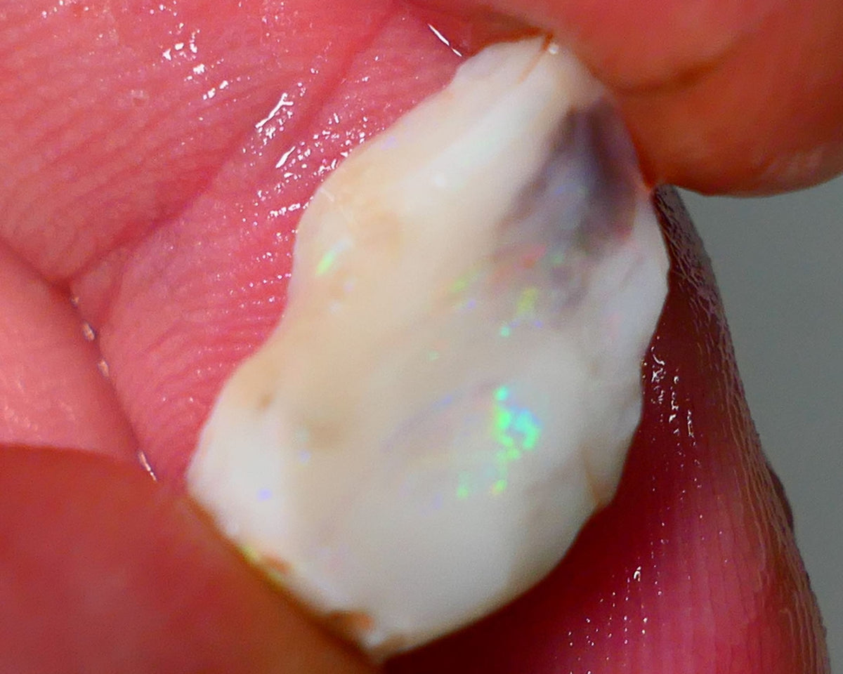 Lightning Ridge Rough Opal 9.40cts Light base Seam showing Yellow Dominant M.colours to cut 18x13x10mm NS331