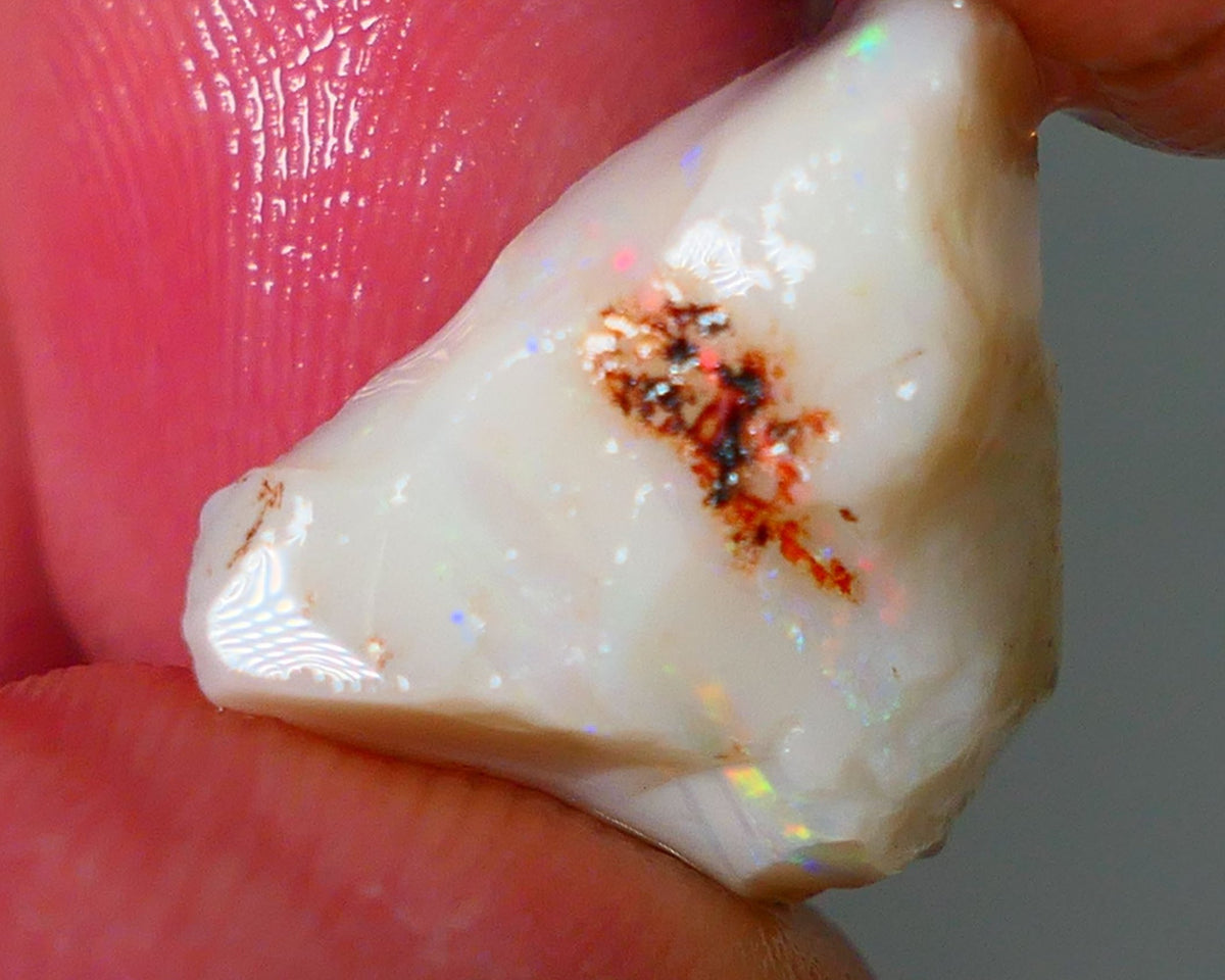 Lightning Ridge Rough Opal 9.40cts Light base Seam showing Yellow Dominant M.colours to cut 18x13x10mm NS331