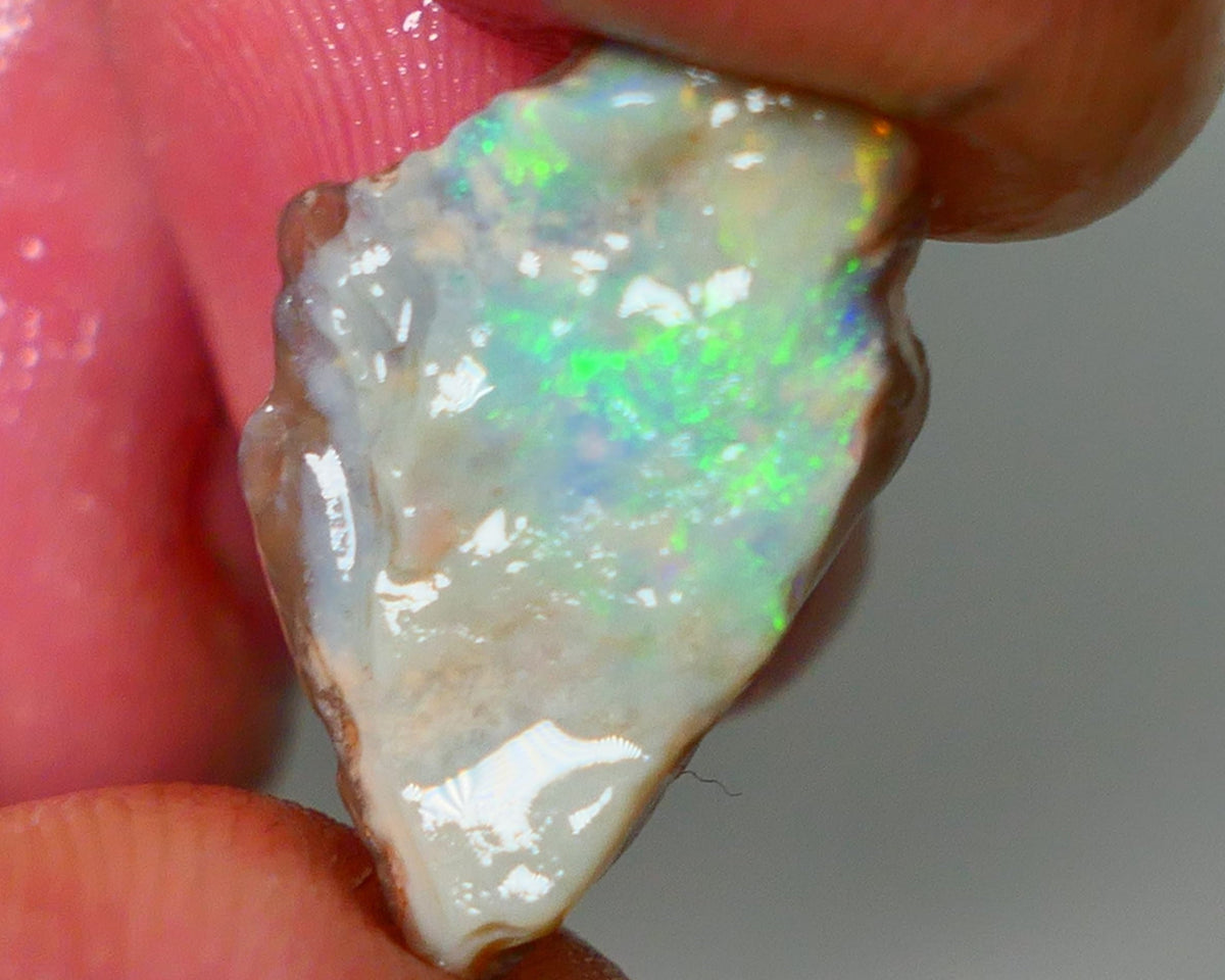 Lightning Ridge Rough Opal 5.00cts Dark Crystal Seam showing Green/Orange Dominant colours 20x11x4mm NS343