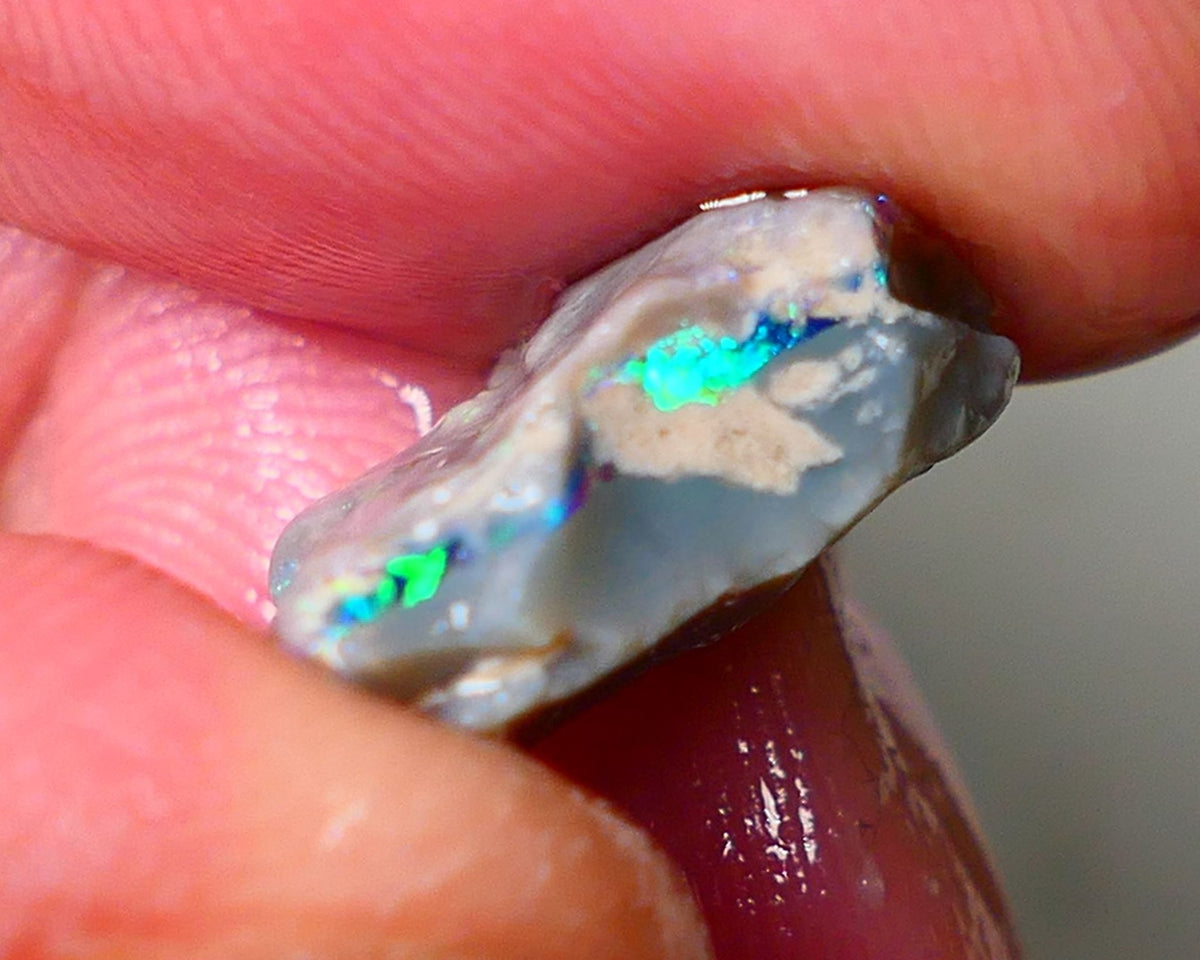 Lightning Ridge Seam opal rough 6.05cts showing Gemmy Very bright consistent flt bar with multi colours to cut worth a gamble on this one cut a gem 16x12x6mm ALP117