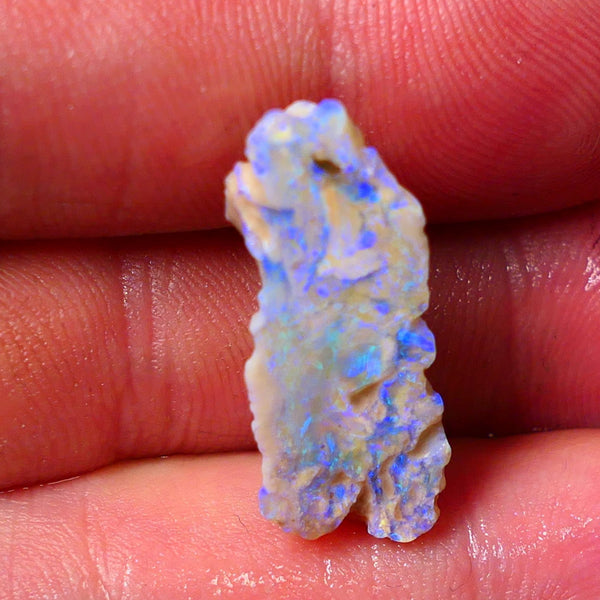 Lightning Ridge Gamble opal rough rub showing nice bright blue colours 26x10x7mm ALP128