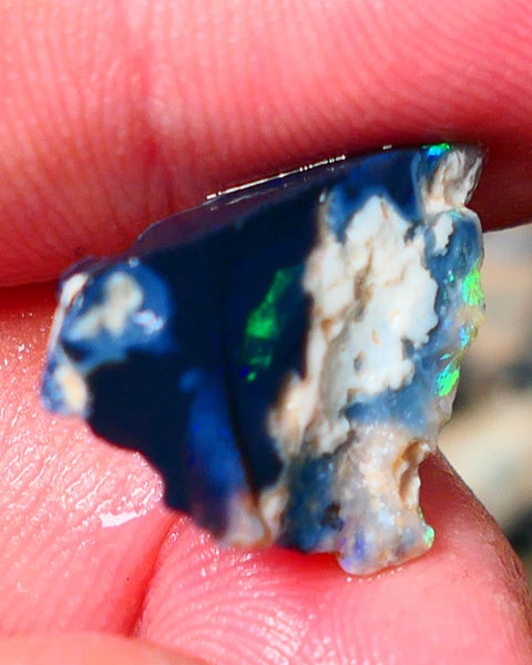 Lightning Ridge Rough rub Black Seam Opal 7.75cts Small area of Green fires only a pointer to be had here :) 21x15x6mm Auction60