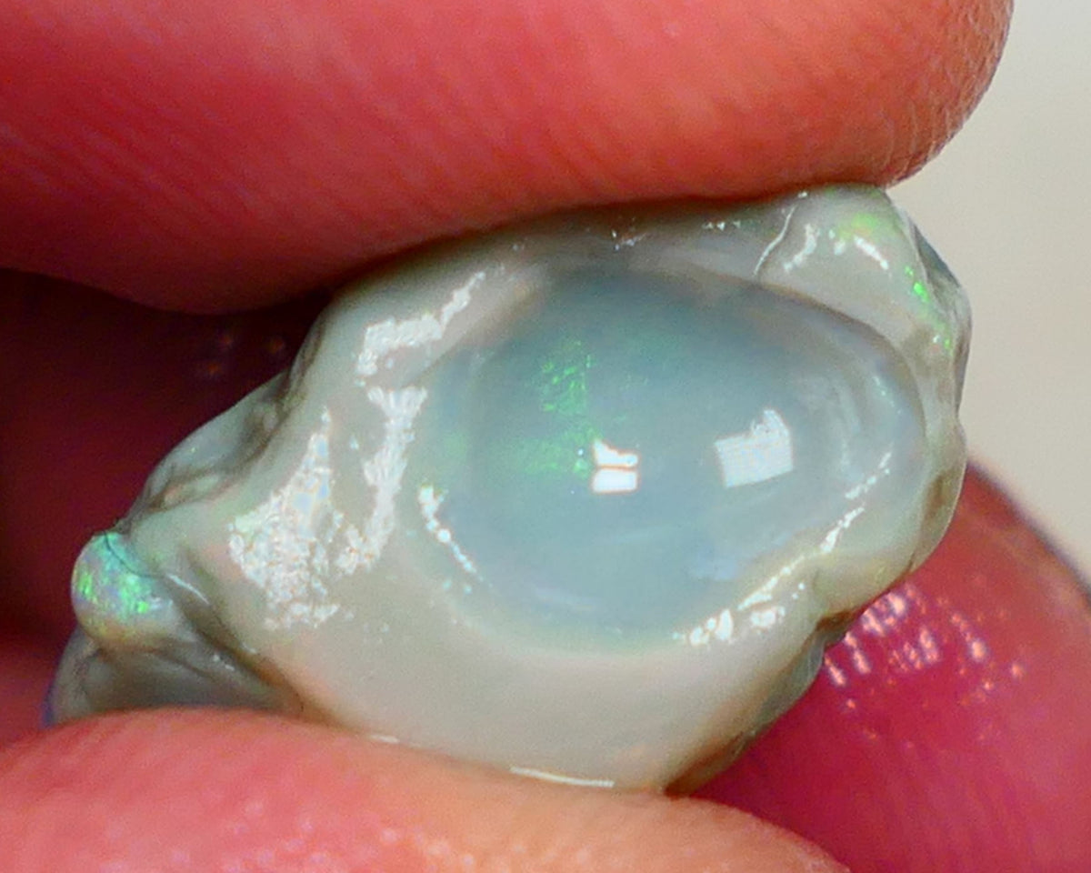 Green centered dominant multi fires on this untouched knobby 12.00cts to Cut and explore 21x13x10mm AUCTION52