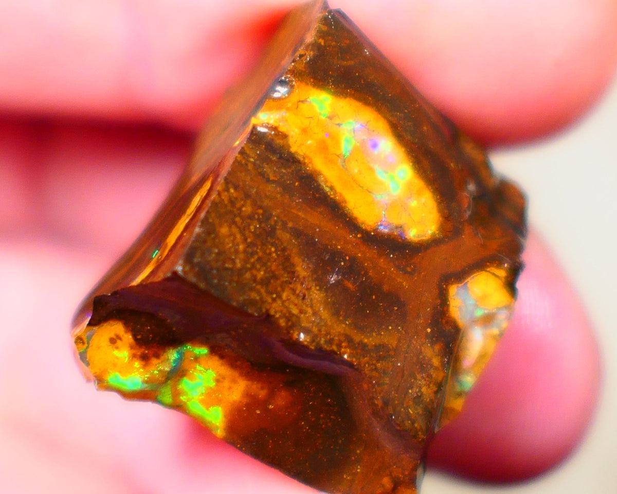 Winton Gem Boulder opal to cut 57.00cts Wonderful Bright & Vibrant Multifires showing on 4 sides time to take the cap off who wants it ? Auction91