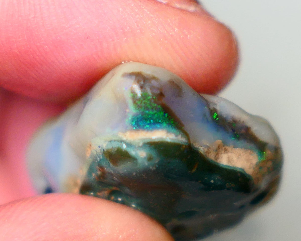 Lightning Ridge Large sized Dark Base Crystal Seam opal rough 49.00cts Showing Greens and Blues to chase & explore to gamble 30x25x13mm Auction92