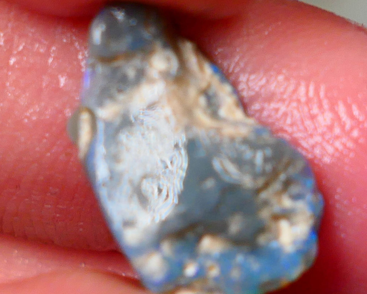 Lightning Ridge Rough Dark base knobby opal 4.50cts showing Greens & Blues in exposed side of bar with blue showing through the skin gamble to cut 16x10x5mm Auction90