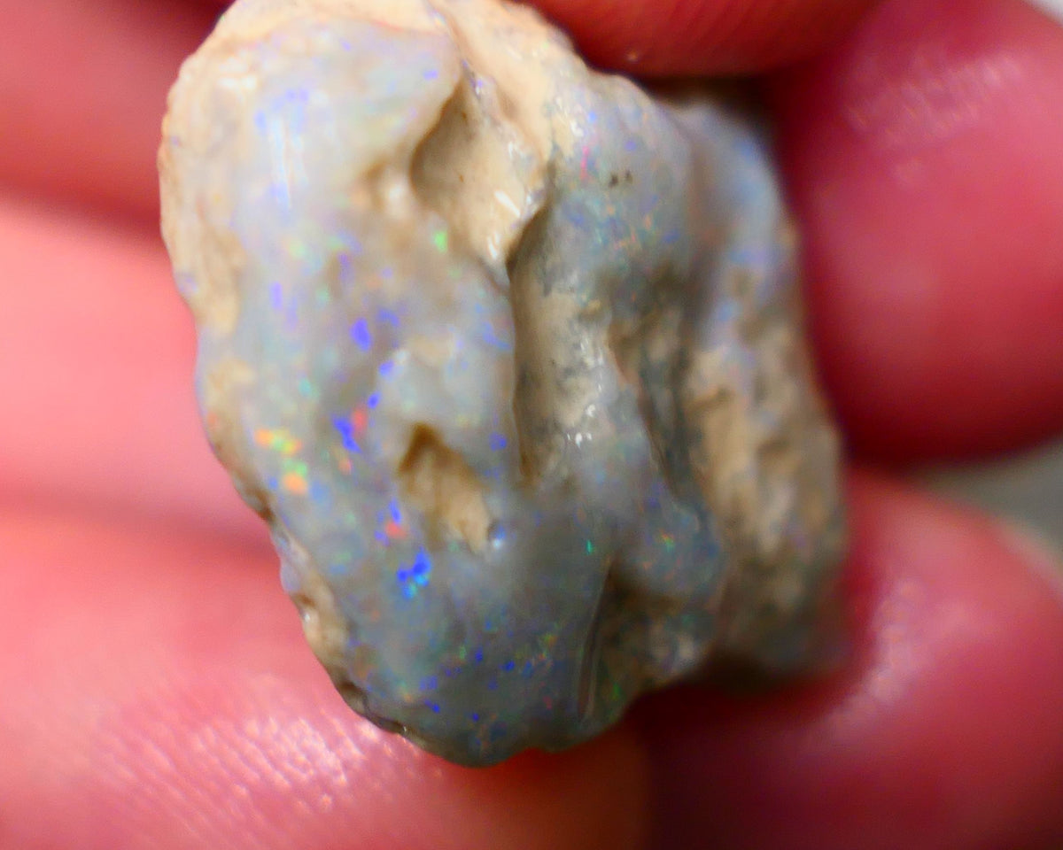 Lightning Ridge Knobby opal formation rough 25.00cts Displaying nice Pastel tones & colours of Multifires 21x20x9mm Auction154