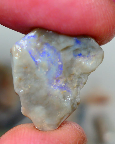 Mintabie Dark base seam opal rough 8.75cts Showing Bright blues throughout 21x18x5mm Auction194