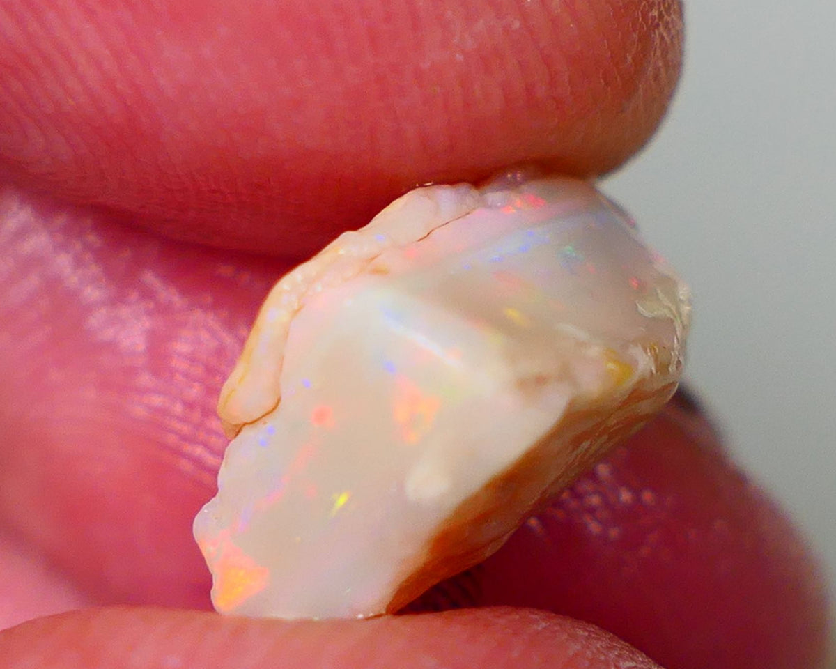 Mintabie Light Base Seam opal 5.75cts Multicolour fires showing  in the bar sold as gamble 13x10x8mm Auction195