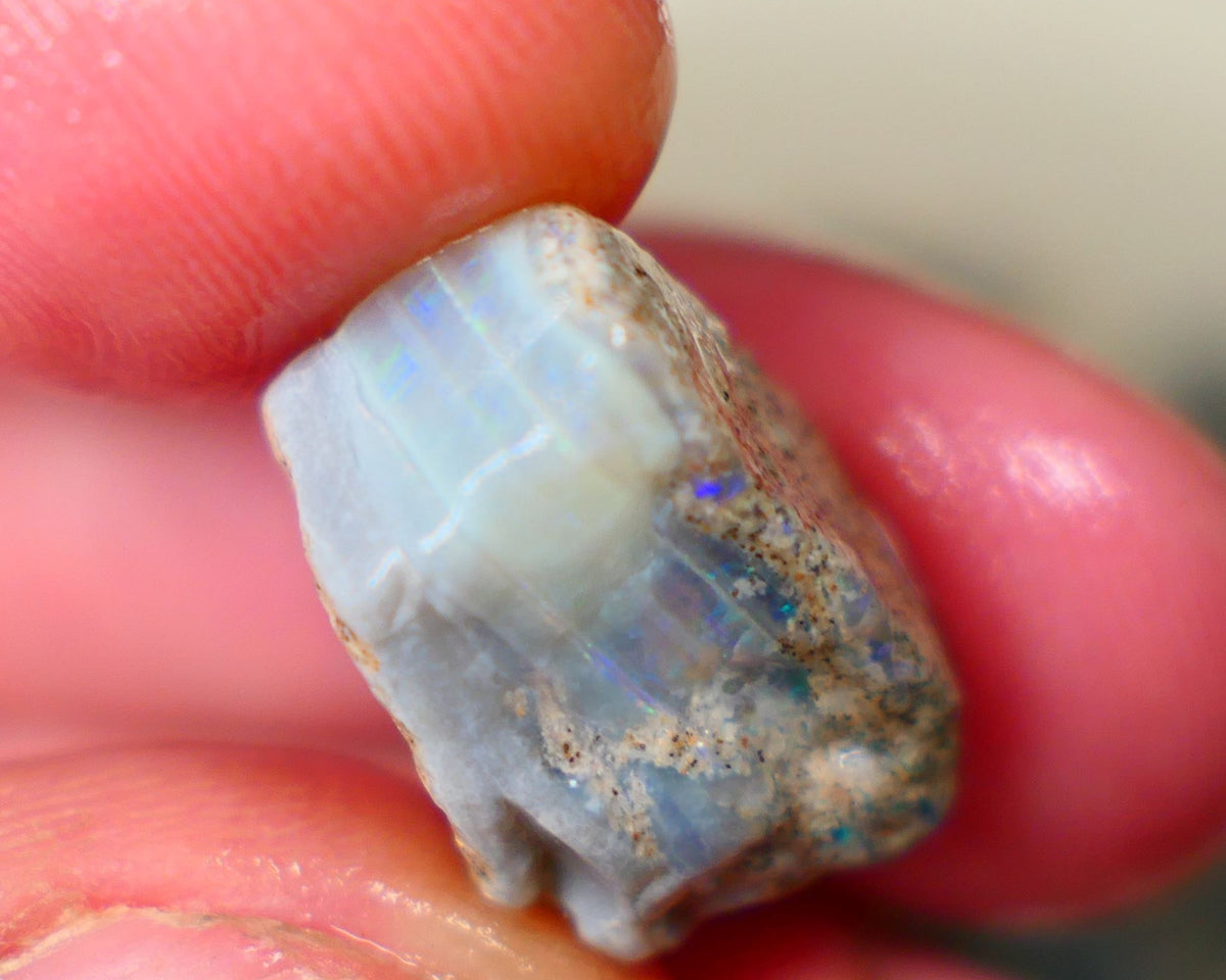 Mintabie Seam opal rough 13.50cts Multicolours showing in the exposed bar sold as gamble Auction211