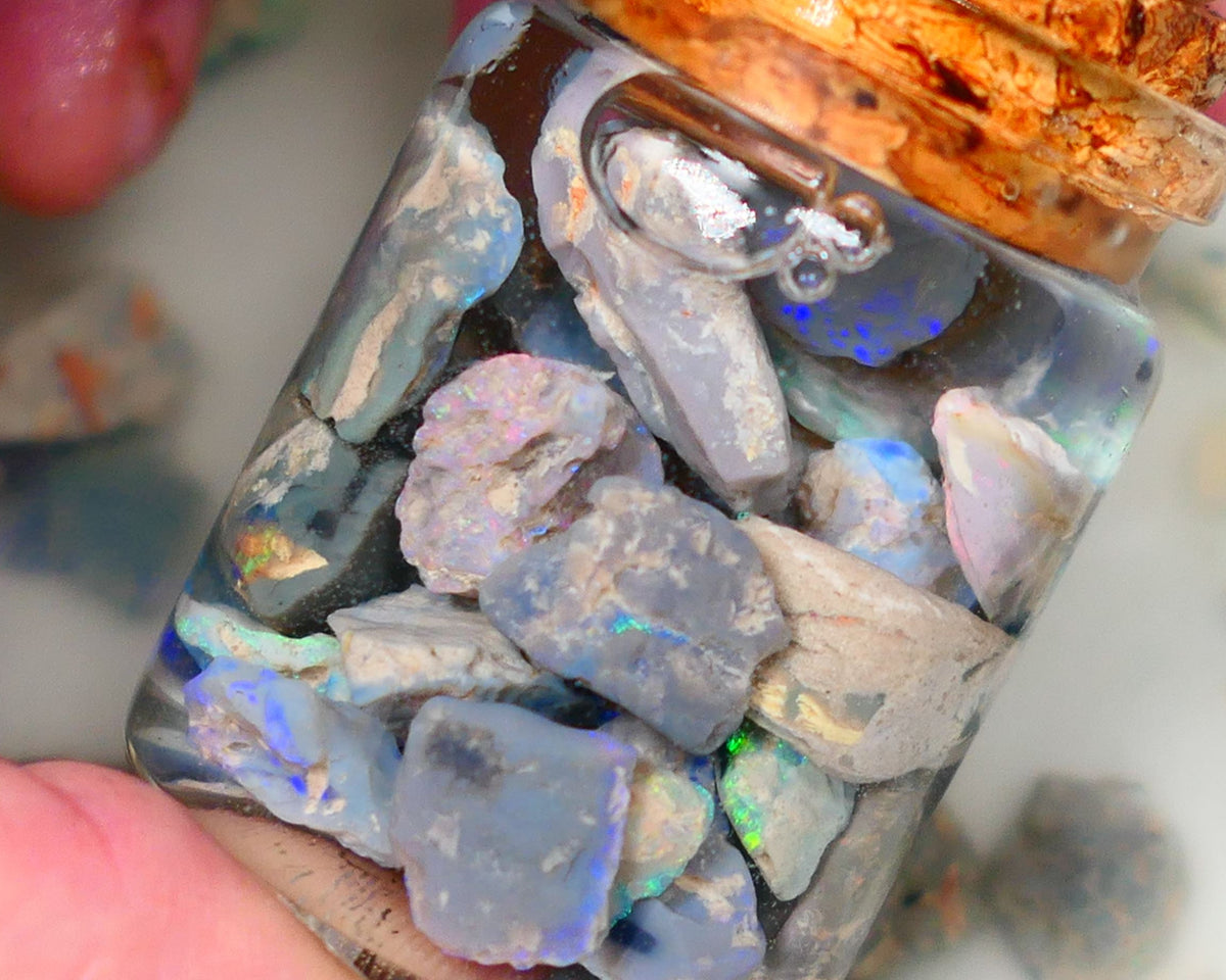 Lightning Ridge Potch & Colours Dark base & Crystal opal rough 150.00cts Lots of colours to go at 15mm to chip size GMB-051