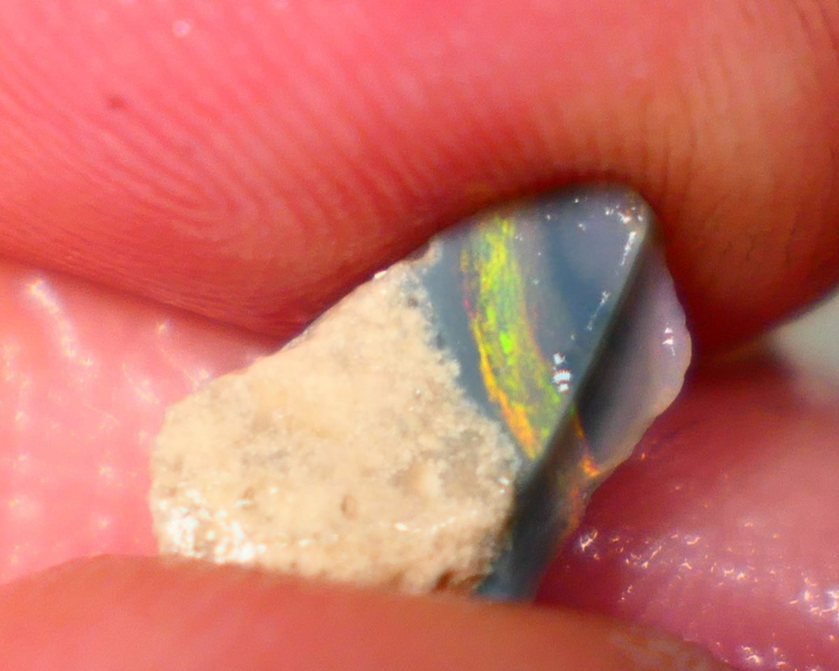 Mulga Semi Black Seam opal rough 1.20cts Stunning Multifires with Oranges being dominant 12x8x3mm  GMB-030