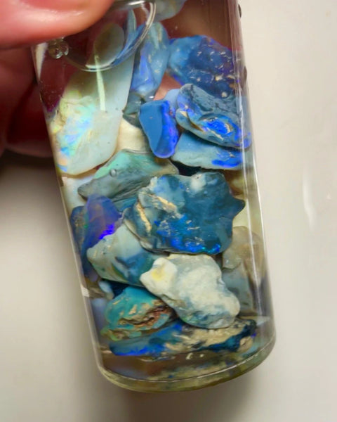 Lightning Ridge Rough Seam Opal Parcel 315cts Nice Sized Dark Seams with lots Potential & some Cutters Lots Bright colours mostly Blues 27x18x5mm to 13x12x4mm NSW006